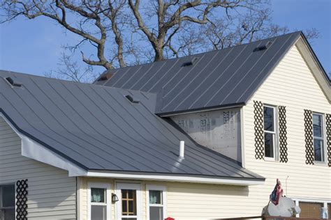 charcoal metal roof white house|dark grey metal roof.